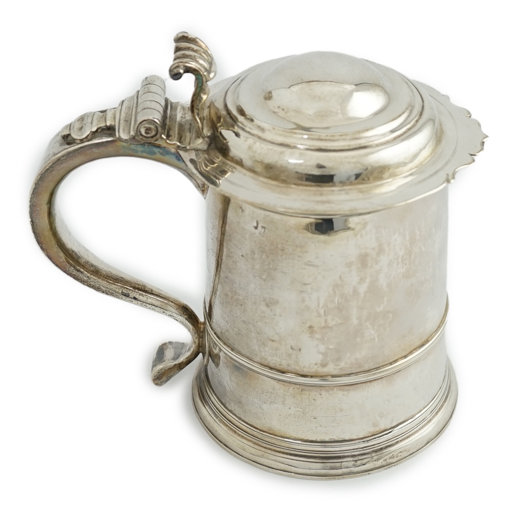 A late Queen Anne Britannia standard silver tankard, maker R?